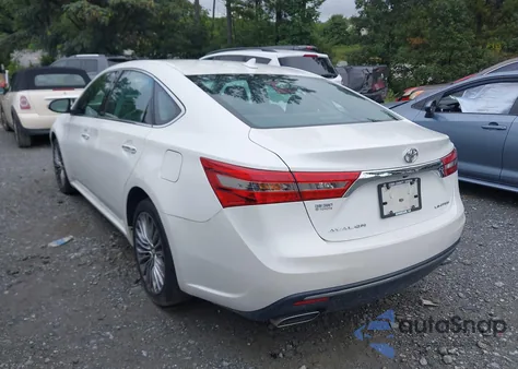2016 Toyota Avalon Limited z USA, uszkodzony, nr VIN 4T1BK1EB9GU236826
